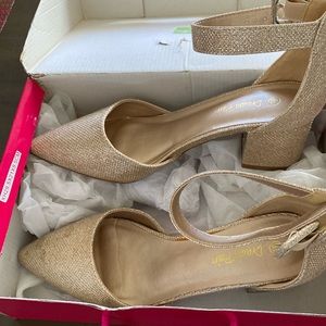 8 1/2 women’s gold glitter 2” ankle buckle strap heels. New/never worn.